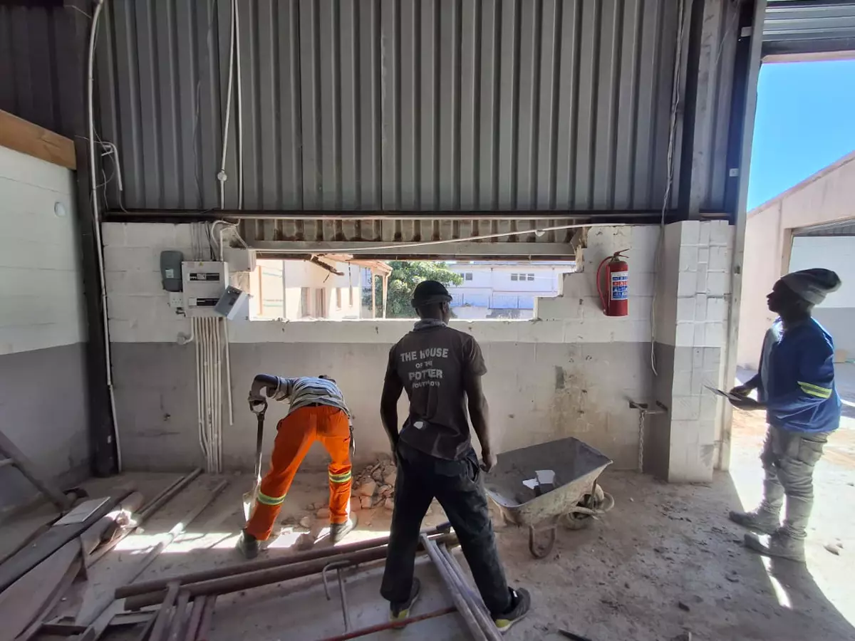 The team at work inside a building