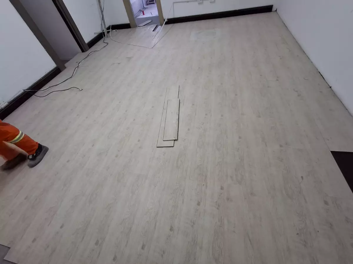 New flooring laid in a renovated room